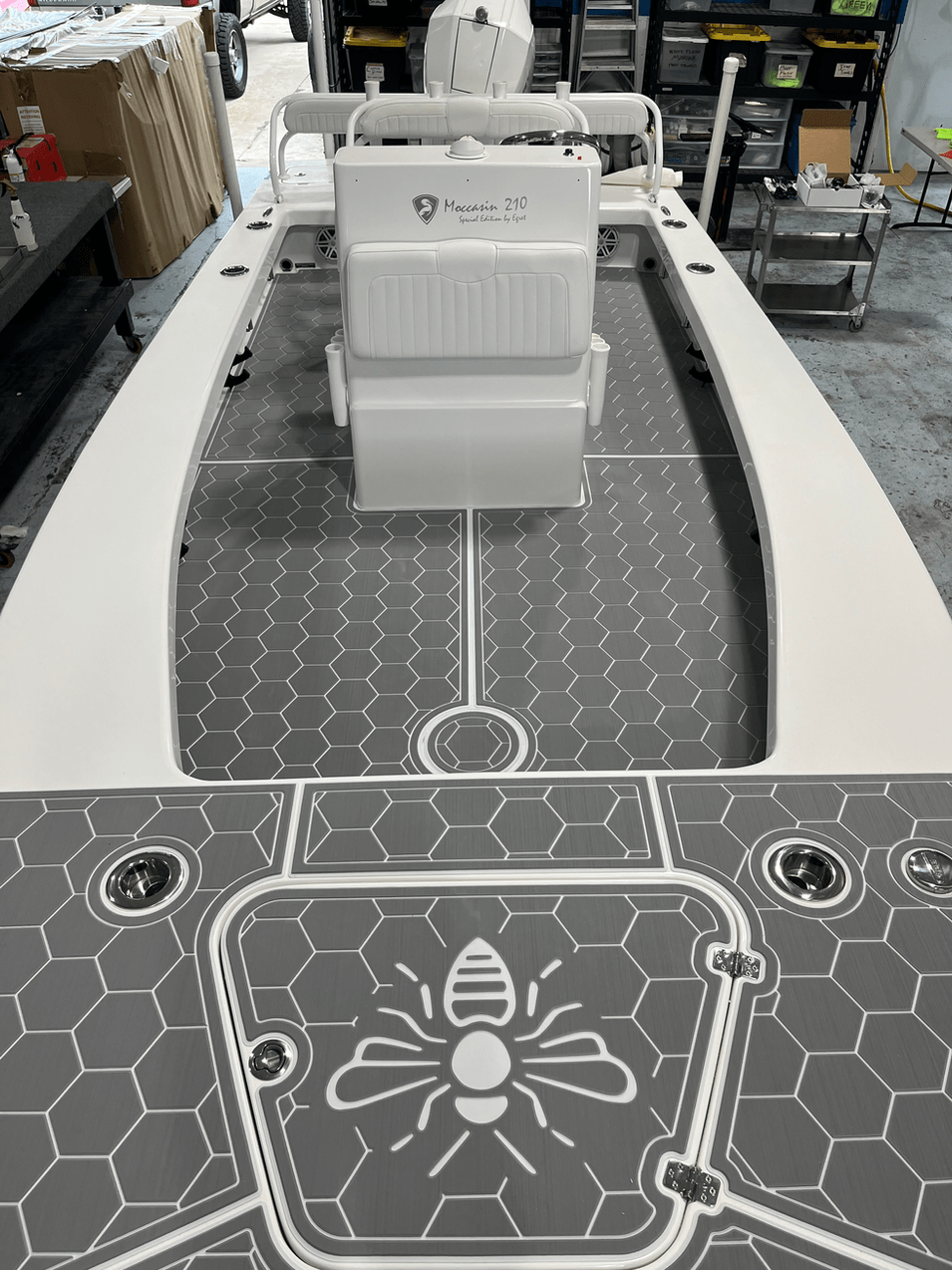 Boat deck with hexagon routing and bee artwork
